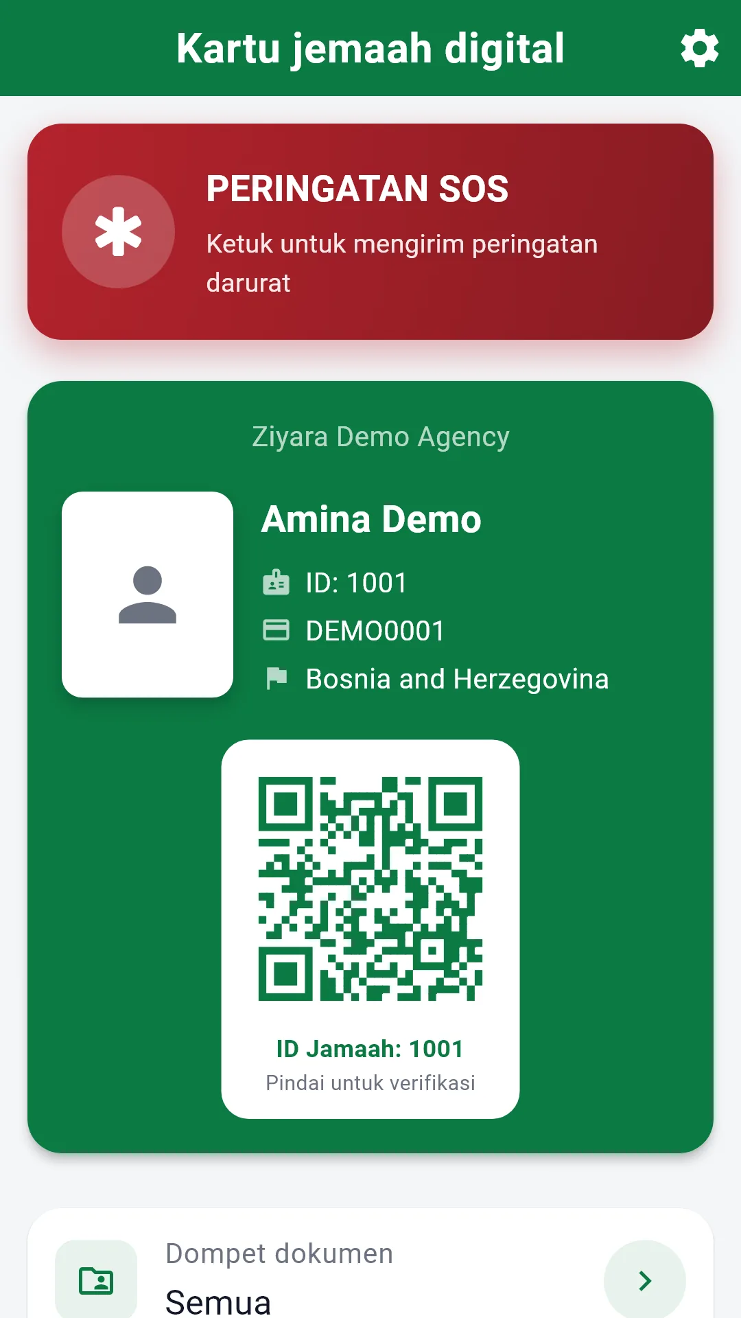 Aplikasi jemaah Ziyara menampilkan contoh kartu identitas digital, kode QR, dan tombol SOS.